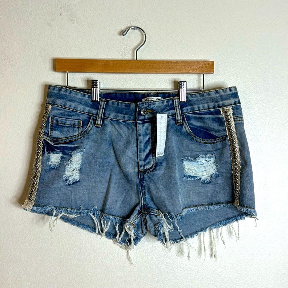 Others follow ladies cut off distressed denim shorts with beaded sides size 30